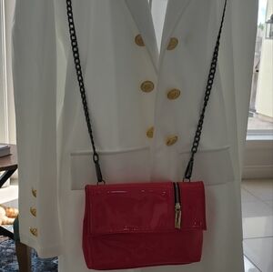 Hot Pink Leather Crossbody Bag with Modern Design